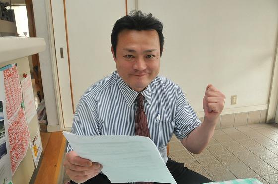役場前のスーパー「ヒグチ」の樋口社長の写真