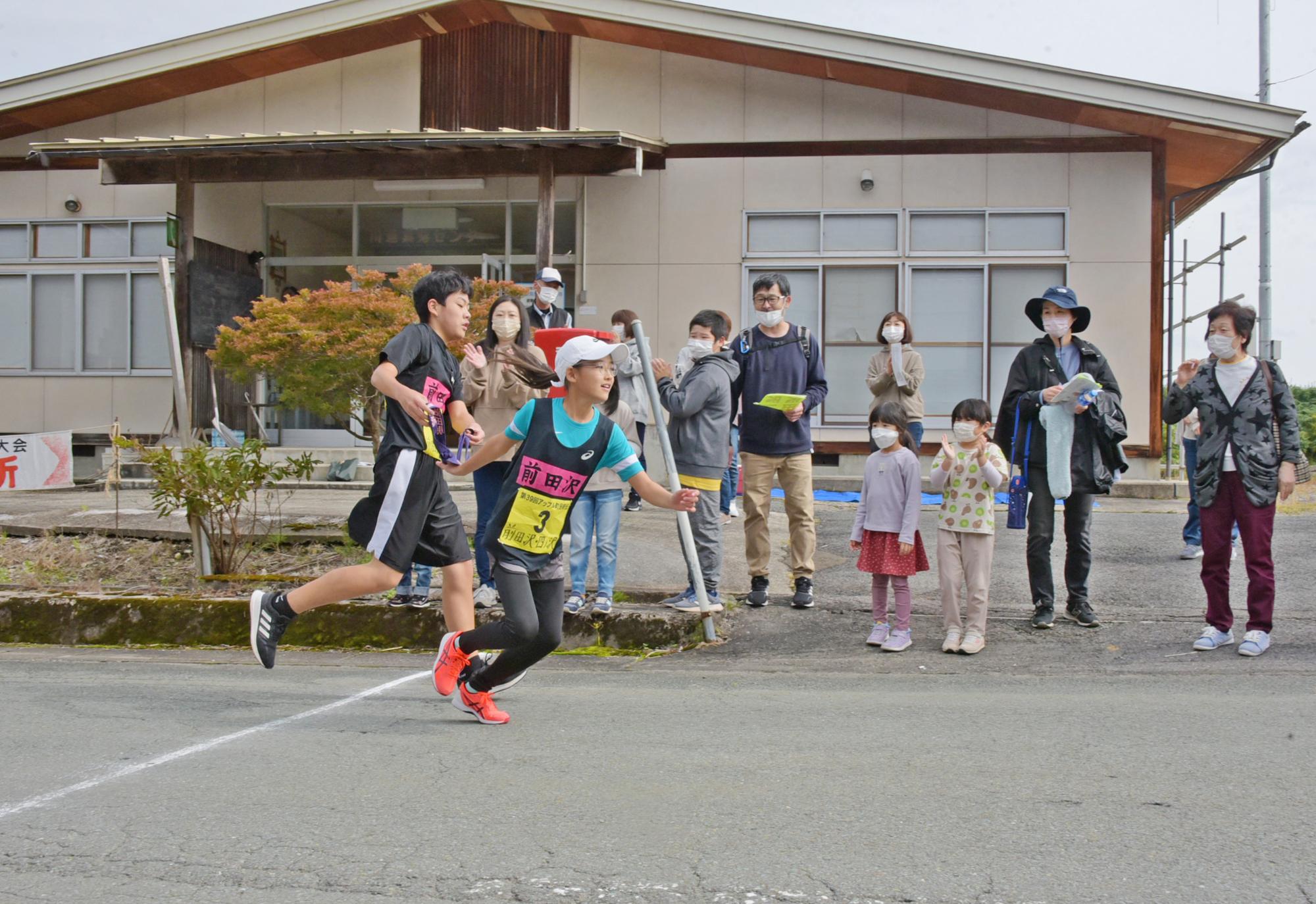 第5区川通公民館前タスキリレー