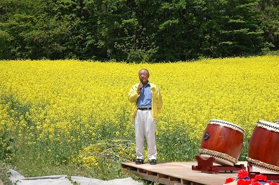 「水本菜の花協議会」の岡崎吉博会長の写真